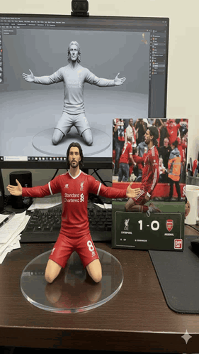 Soccer Player Statue in Red Uniform Number 8