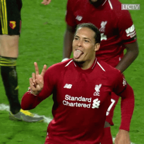 Soccer Player Sticking Out Tongue Red Standard Chartered Shirt GIF