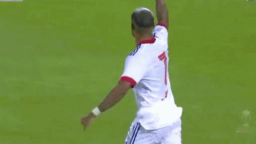 Soccer Player Tackled in White Adidas Jersey