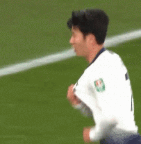 Soccer Player Taking Off Shirt