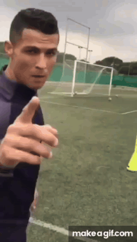 Soccer Player Thumbs Up on Field