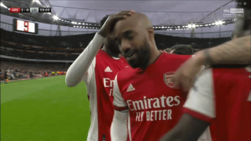 Soccer Player Wearing A Red Emirates Fly Better Shirt GIF