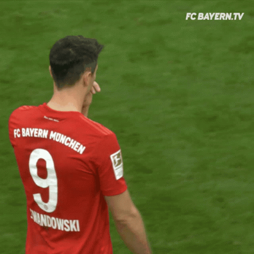 Soccer Player Wearing A Red Jersey With The Number 9 On It GIF