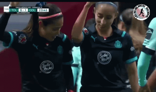 Soccer Player Wearing Sello Rojo Shirt