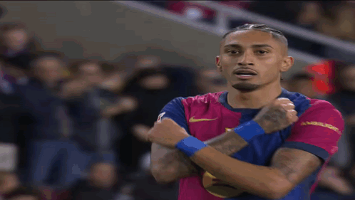 Soccer Player Wearing Spotify Shirt