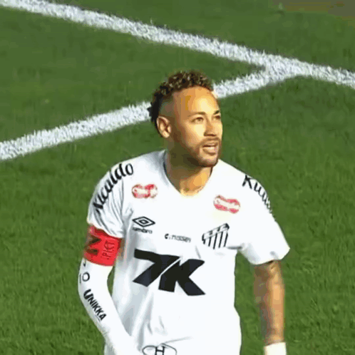 Soccer Player Wearing White Shirt with K