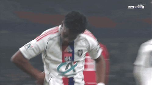 Soccer Player White Jersey Ol In Front Of Another GIF