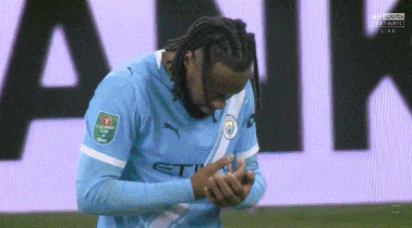 Soccer Player with Dreadlocks Wearing City Shirt
