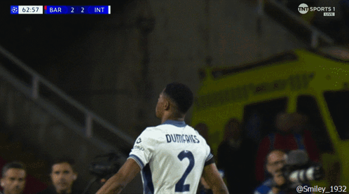 Soccer Player With Dunfries on Back