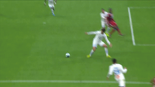 Soccer Player With Number 15 Trying to Get Ball