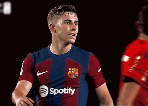 Soccer Player With Spotify Logo On Jersey GIF