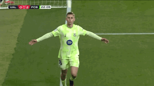 Soccer Player With Spotify Logo on Jersey