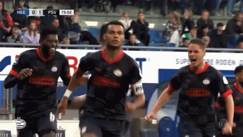 Soccer Players Celebrating Goal