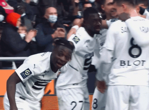 Soccer Players Celebrating Goal