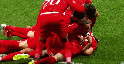 Soccer Players Celebrating Goal