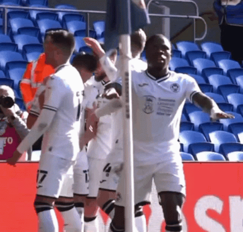 Soccer Players Celebrating Goal SR