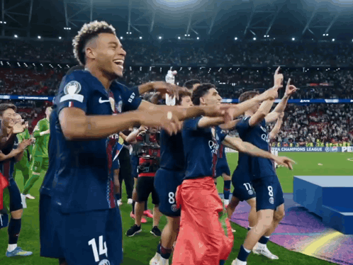 Soccer Players Celebrating Number 14