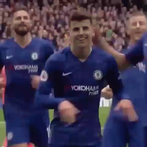 Soccer Players Dancing in Blue Jerseys