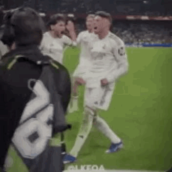 Soccer Players Dancing on Field