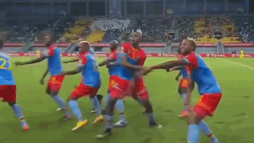 Soccer Players Dancing On Field GIF