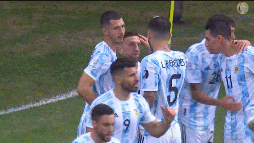 Soccer Players Huddled With Number 5