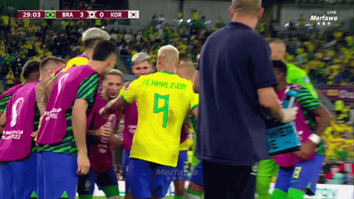 Soccer Players Huddled With Number 9