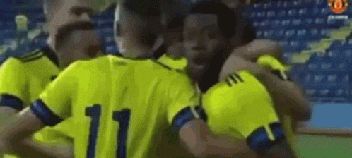 Soccer Players Hugging In Huddle GIF