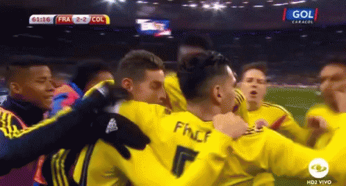 Soccer Players Hugging Number 7 Shirt