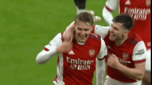 Soccer Players Hugging On Field GIF