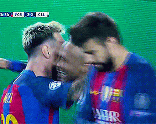 Soccer Players Hugging