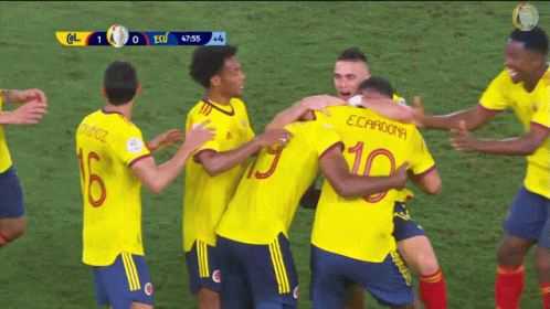 Soccer Players Hugging With Number 10 on Back