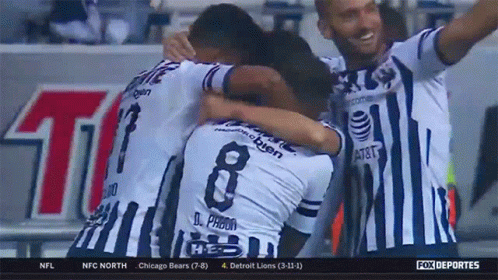 Soccer Players Hugging With Number 8
