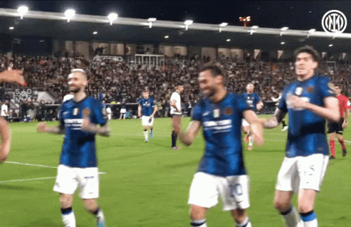 Soccer Players in Blue and White Jerseys Number 10