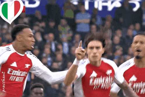 Soccer Players In Emirates Jerseys Celebrating Goal GIF