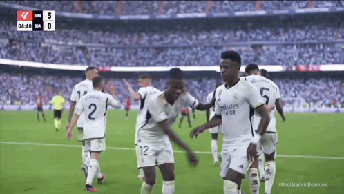 Soccer Players In Fly Emirates United Jerseys Celebrating GIF