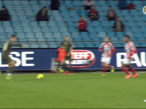 Soccer Players In Front Of Teff Sign GIF