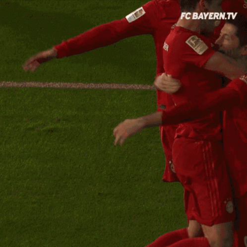 Soccer Players in Red T-Mobile Jerseys Celebrating