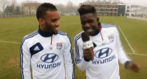 Soccer Players In White Hyundai Jerseys Talking GIF