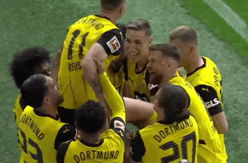 Soccer Players in Yellow Dortmund Jerseys