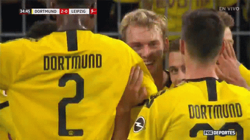 Soccer Players in Yellow Dortmund Jerseys
