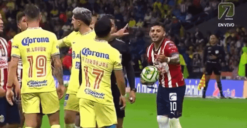 Soccer Players in Yellow Jerseys with Corona