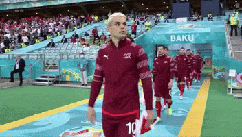 Soccer Players Leaving Stadium with Baku Sign