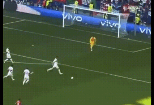Soccer Players On A Field With A Banner That Says Vivo GIF