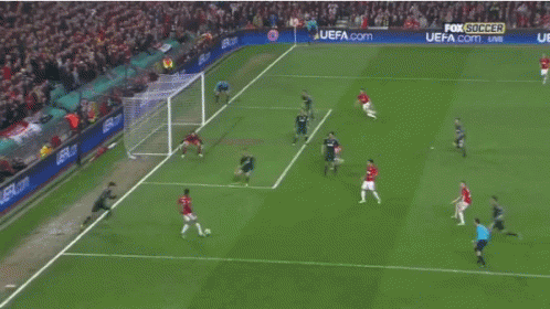 Soccer Players On A Field With A Fox Soccer Ad GIF