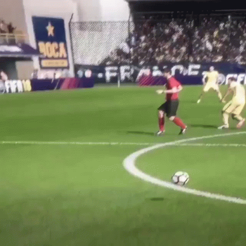 Soccer Players On A Field With A Sign That Says Boca GIF