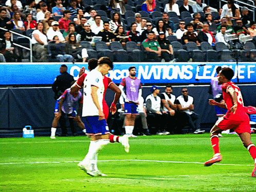 Soccer Players On A Field With A Sign That Says Nations League GIF