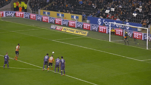 Soccer Players On A Field With Ads For Sky Bet Betting Better GIF