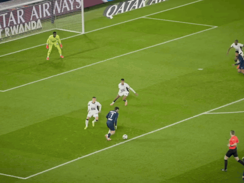 Soccer Players On A Field With An Ad For Qatar Airways In The Background GIF