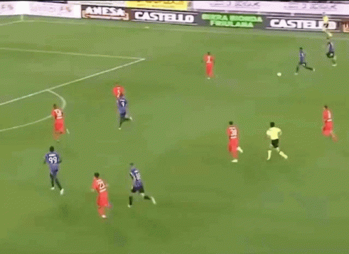 soccer players on a field with banners for castello