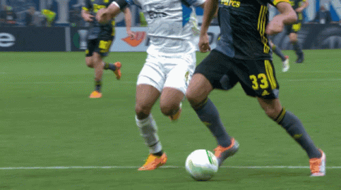 Soccer Players On A Field With One Wearing A Jersey That Says Euro Volley GIF